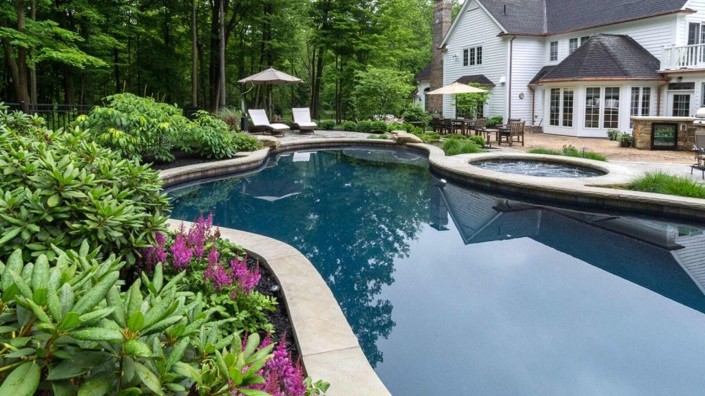 Perfecting Your Poolside Paradise: Exploring the Benefits of Landscape Planning and Regular Maintenance